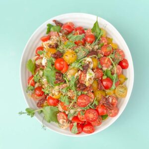 Mini mozzarella, cherry tomato, creamy beans, sun-dried tomato and basil